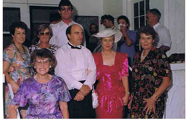 Christine and I surrounded by family members.
